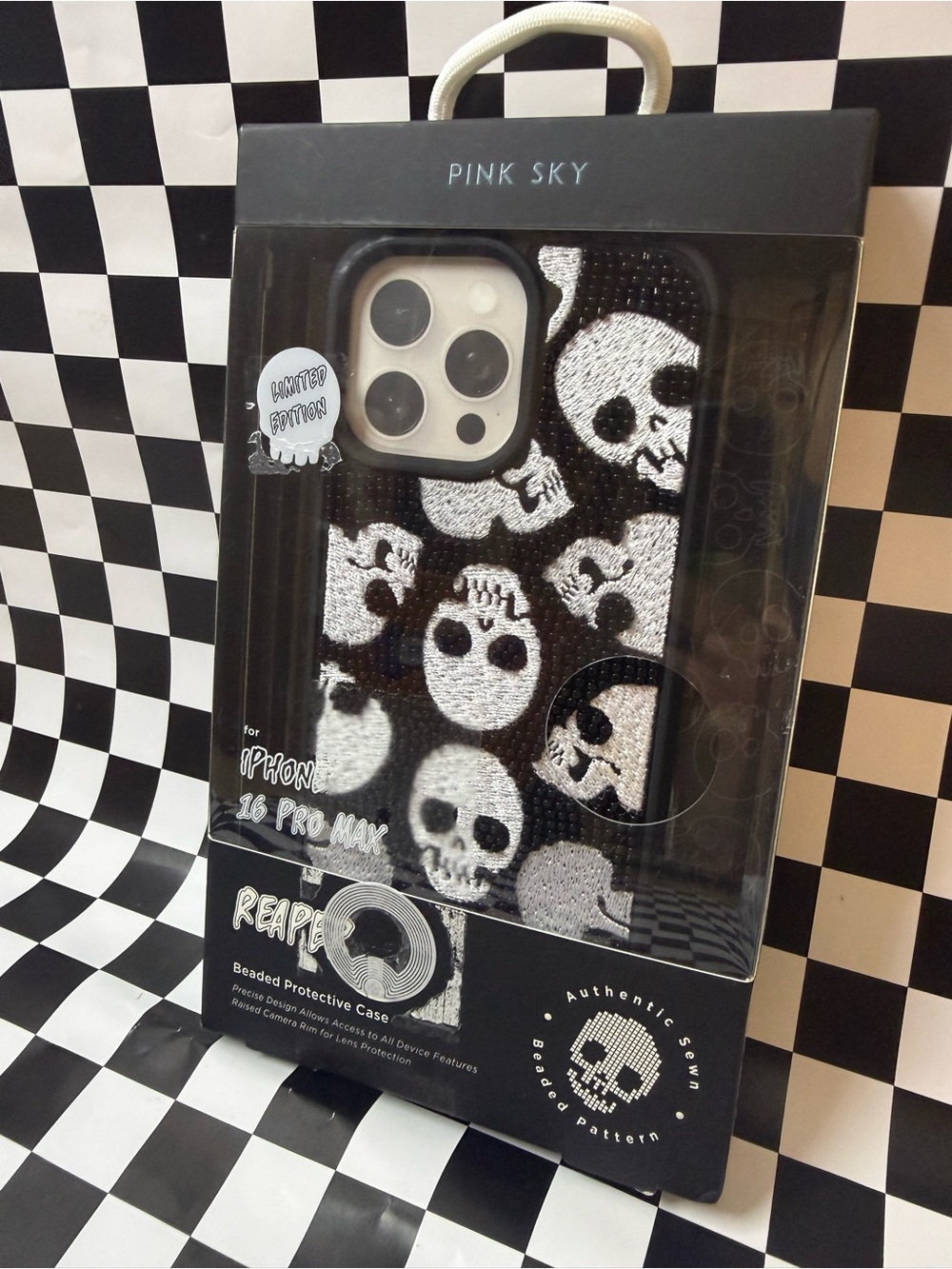 Pink Sky Black & White Skull Beaded iPhone Case (iPhone 16 Pro Max)